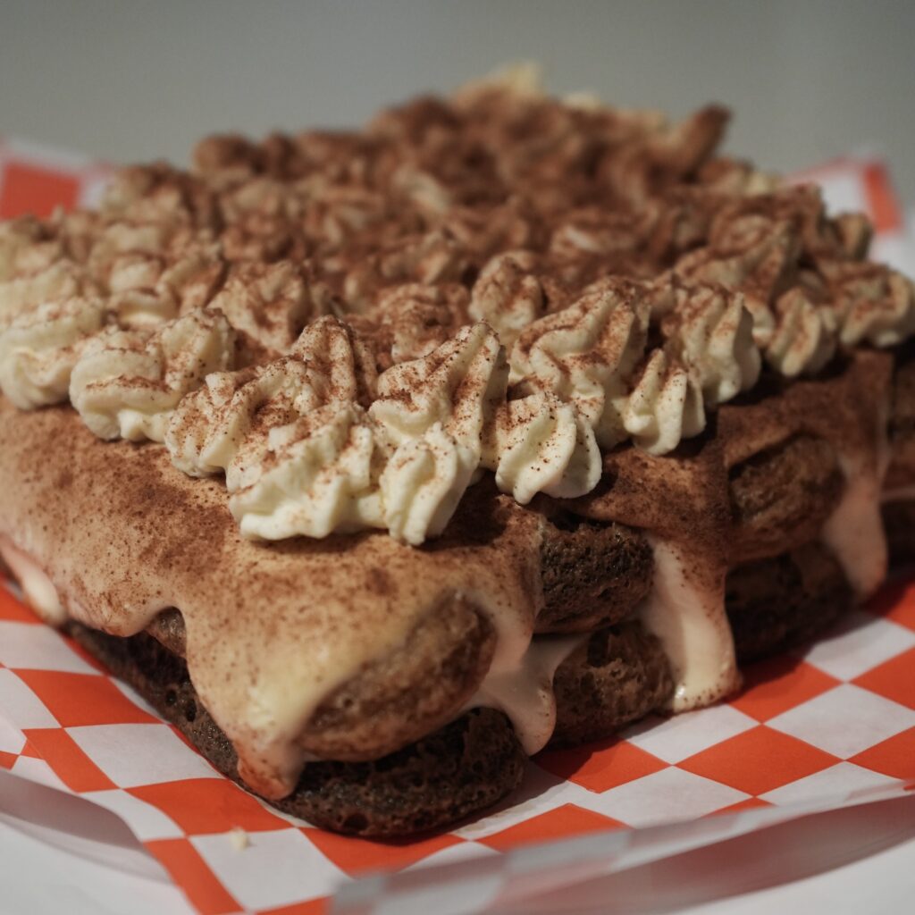 tiramisu on red checked paper