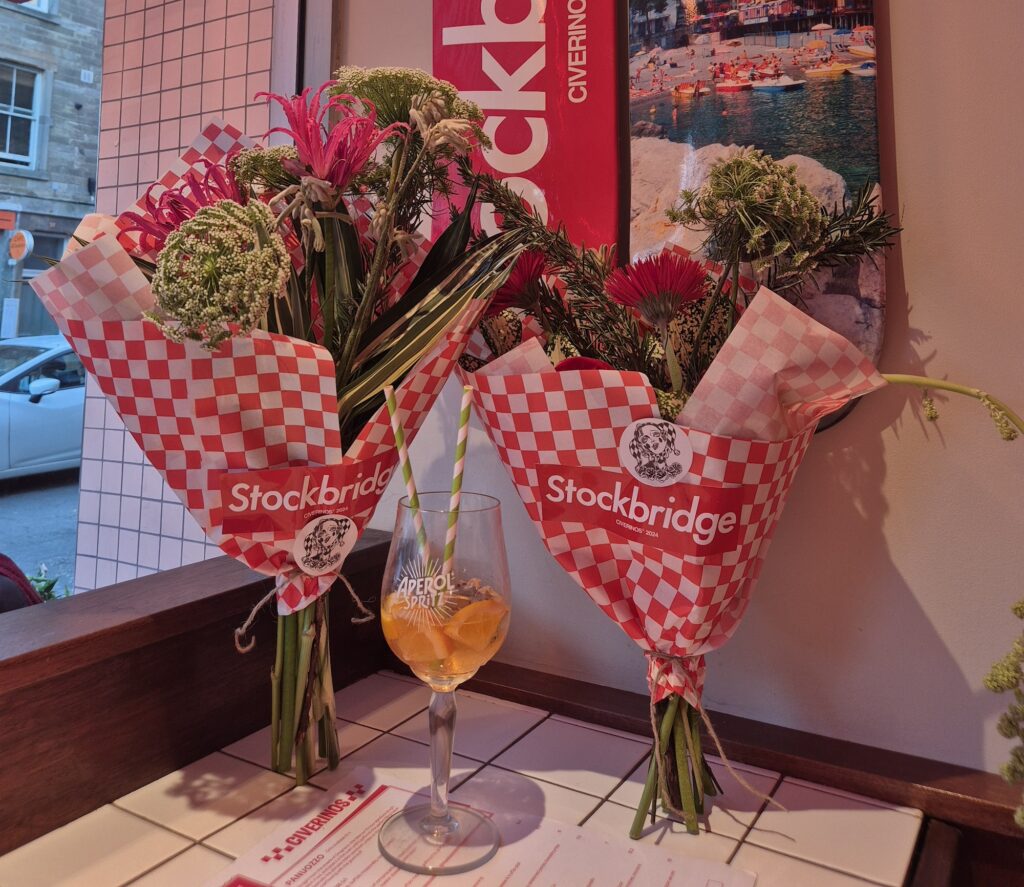 two bouquets of flowers on side table at Civerinos Stockbridge